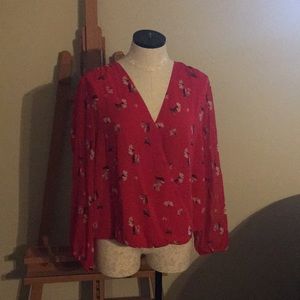 Red printed wrap blouse.